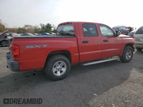 2008 Dodge Dakota SXT z VIN 1D7HW38KX8S542737, wystawiony jako Copart lot #78130834 z przebiegiem 60 496 mil mil oraz Szkoda całkowita • Salvage title. Historia ofert i sprzedaży dostępna na DreamBid. Obrazek 3.