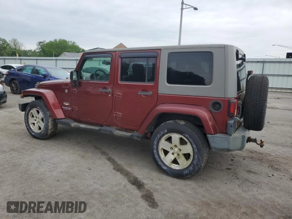 2008 Jeep Wrangler Unlimited Sahara z VIN 1J8GA59108L648333, wystawiony jako Copart lot #57430015 z przebiegiem 506 770 mil mil oraz Czysty tytuł • Clean title. Historia ofert i sprzedaży dostępna na DreamBid. Obrazek 2.