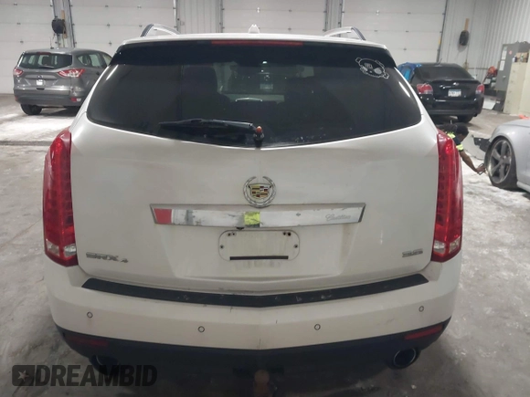 2012 Cadillac SRX Premium Collection with VIN 3GYFNFE39CS561614, listed as a IAAI auction lot 42529959 with 59,088 mi miles and . Bid and sale history available at DreamBid. Image 16.