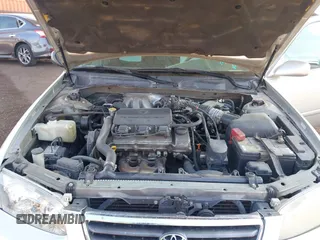 2001 Toyota Camry LE z VIN JT2BF22K710334750, wystawiony jako IAAI lot #42422525 z przebiegiem 273 999 mil mil oraz . Historia ofert i sprzedaży dostępna na DreamBid. Obrazek 9.