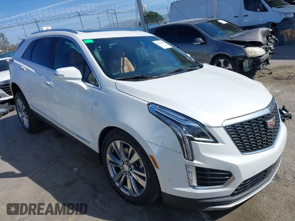 2023 Cadillac XT5 AWD Premium Luxury with VIN 1GYKNDRS4PZ195431, listed as a IAAI auction lot 41714459 with 13,207 mi miles and . Bid and sale history available at DreamBid. Image 1.