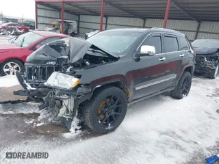2012 Jeep Grand Cherokee Limited with VIN 1C4RJFBGXCC179054, listed as a IAAI auction lot 41729596 with 207,257 mi miles. Bid and sale history available at carsss.com. Image 2.