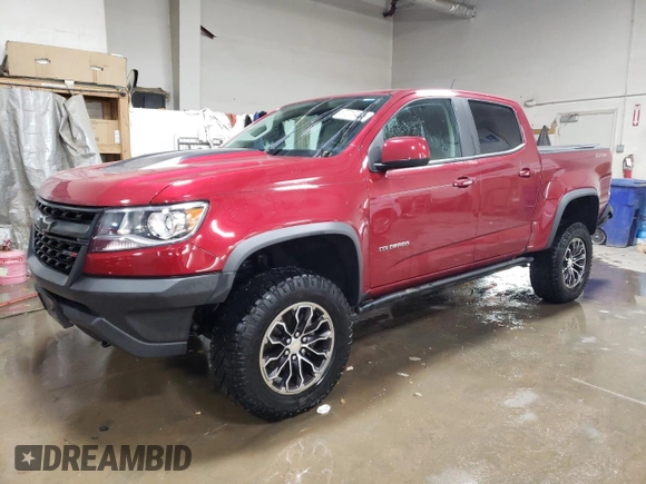 2020 Chevrolet Colorado 4WD ZR2 with VIN 1GCGTEEN6L1108483, listed as a Copart auction lot 87216404 with 27,520 mi miles and Salvage title. Bid and sale history available at DreamBid. Image 1.