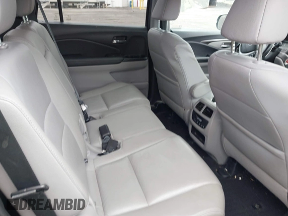 2017 Honda Pilot EX-L with VIN 5FNYF6H50HB101394, listed as a IAAI auction lot 42083318 with 159,359 mi miles and . Bid and sale history available at DreamBid. Image 8.