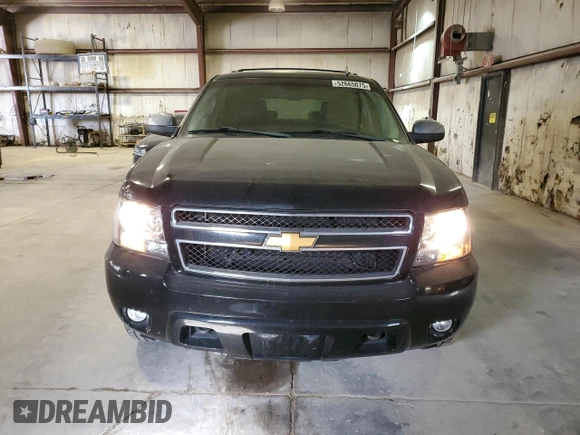 2013 Chevrolet Tahoe LT with VIN 1GNSKBE01DR288157, listed as a Copart auction lot 52665075 with 152,068 mi miles and Salvage Title. Bid and sale history available at DreamBid. Image 5.