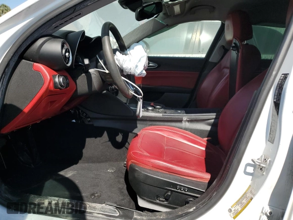 2018 Alfa Romeo Giulia z VIN ZARFAEBN6J7597943, wystawiony jako Copart lot #88288745 z przebiegiem 105 551 mil mil oraz Szkoda całkowita • Salvage title. Historia ofert i sprzedaży dostępna na DreamBid. Obrazek 7.