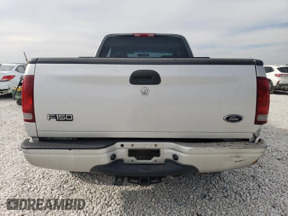 2002 Ford F-150 XL with VIN 1FTRX17282NA63790, listed as a Copart auction lot 42057394 with 158,054 mi miles and Salvage Title. Bid and sale history available at carsss.com. Image 6.