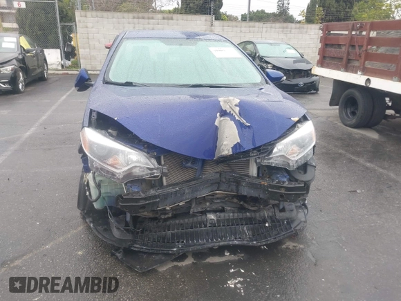 2014 Toyota Corolla L with VIN 5YFBURHE8EP173523, listed as a IAAI auction lot 41802729 with 77,336 mi miles and . Bid and sale history available at DreamBid. Image 13.