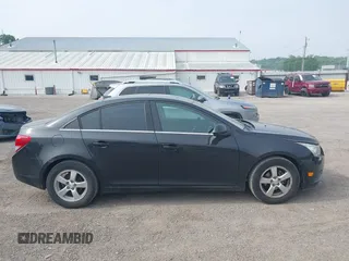 2014 Chevrolet Cruze 1LT with VIN 1G1PC5SB0E7291575, listed as a IAAI auction lot 42417379 with 111,705 mi miles and . Bid and sale history available at DreamBid. Image 14.