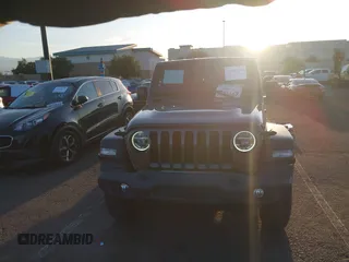 2021 Jeep Wrangler Unlimited Sport S z VIN 1C4HJXDG7MW583315, wystawiony jako IAAI lot #41827899 z przebiegiem 25 264 mil mil oraz . Historia ofert i sprzedaży dostępna na DreamBid. Obrazek 13.