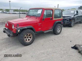 1998 Jeep Wrangler Sport with VIN 1J4FY19SXWP751159, listed as a IAAI auction lot 42195091 with 155,996 mi miles and . Bid and sale history available at DreamBid. Image 2.
