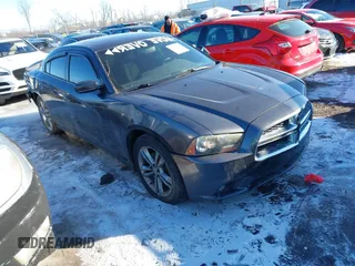 2013 Dodge Charger RT Plus with VIN 2C3CDXDT7DH558898, listed as a IAAI auction lot 41364210 with 144,351 mi miles. Bid and sale history available at carsss.com. Image 1.