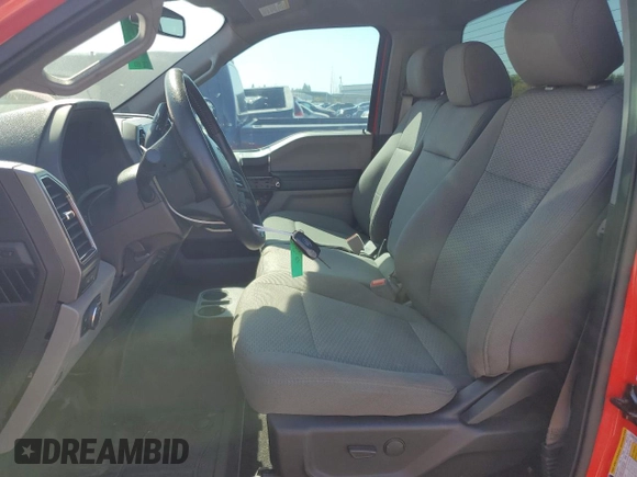 2019 Ford F-150 XL with VIN 1FTMF1E57KKC36789, listed as a Copart auction lot 69457224 with 26,509 mi miles and Salvage title. Bid and sale history available at DreamBid. Image 7.