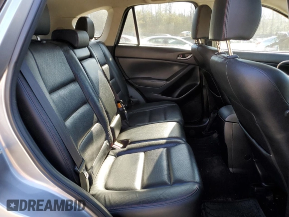 2015 Mazda CX-5 Grand Touring with VIN JM3KE4DY5F0460465, listed as a Copart auction lot 46392605 with 103,185 mi miles and Salvage Title. Bid and sale history available at carsss.com. Image 11.