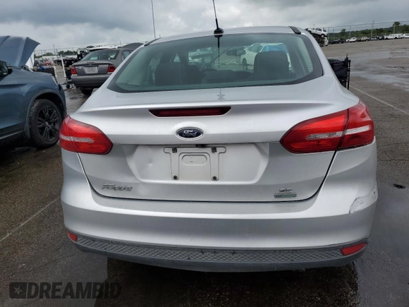 2016 Ford Focus SE with VIN 1FADP3FE5GL233081, listed as a Copart auction lot 65498195 with 89,674 mi miles and Salvage title. Bid and sale history available at DreamBid. Image 6.