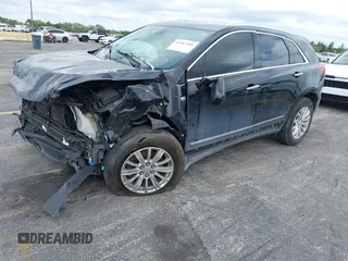 2018 Cadillac XT5 FWD z VIN 1GYKNARS3JZ137039, wystawiony jako IAAI lot #41667581 z przebiegiem 98 281 mil mil oraz . Historia ofert i sprzedaży dostępna na DreamBid. Obrazek 19.