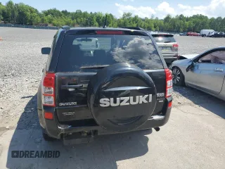 2009 Suzuki Grand Vitara with VIN JS3TD047994100405, listed as a Copart auction lot 62215355 with 127,756 mi miles and Clean title. Bid and sale history available at DreamBid. Image 6.