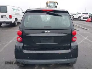 2012 Smart fortwo Pure z VIN WMEEJ3BA9CK521416, wystawiony jako IAAI lot #41847989 z przebiegiem Nie podano mil oraz . Historia ofert i sprzedaży dostępna na DreamBid. Obrazek 17.