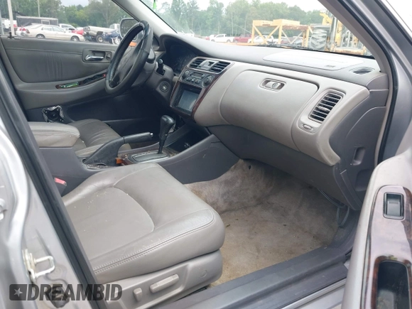 2002 Honda Accord EX z VIN 1HGCG16562A084499, wystawiony jako IAAI lot #42446830 z przebiegiem 241 615 mil mil oraz . Historia ofert i sprzedaży dostępna na DreamBid. Obrazek 5.