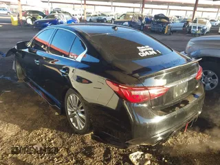 2018 Infiniti Q50 Luxe with VIN JN1EV7AP7JM590173, listed as a IAAI auction lot 41298515 with 99,415 mi miles and . Bid and sale history available at DreamBid. Image 3.