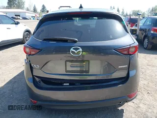 2020 Mazda CX-5 Touring with VIN JM3KFBCM6L1828691, listed as a IAAI auction lot 42100409 with 25,182 mi miles. Bid and sale history available at carsss.com. Image 16.