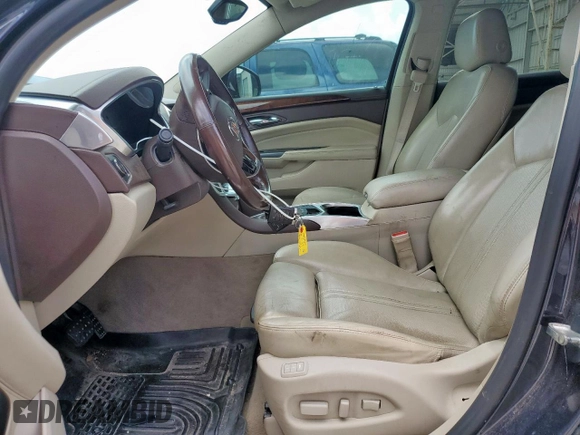 2014 Cadillac SRX Performance Collection с VIN 3GYFNCE34ES580069, выставлен на аукционе Copart как лот 60662415 с пробегом 141 107 миль миль и Списание • Salvage title. История ставок и продаж доступна на DreamBid. Изображение 7.
