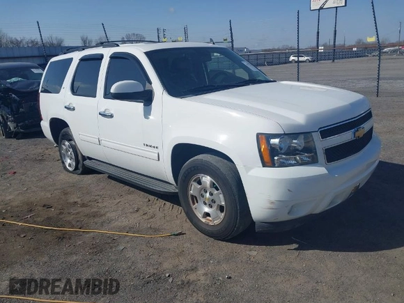 2014 Chevrolet Tahoe LT with VIN 1GNSCBE06ER233105, listed as a IAAI auction lot 41753190 with 161,056 mi miles and . Bid and sale history available at DreamBid. Image 1.