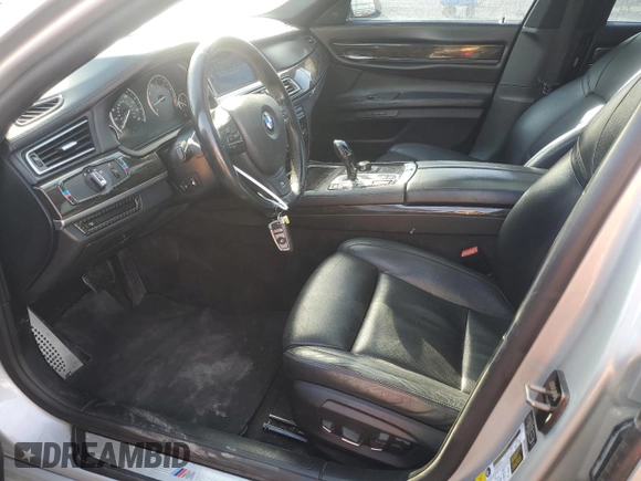 2013 BMW 7 Series 750i xDrive z VIN WBAYB6C53DD223796, wystawiony jako Copart lot #79402144 z przebiegiem 144 125 mil mil oraz Czysty tytuł • Clean title. Historia ofert i sprzedaży dostępna na DreamBid. Obrazek 7.