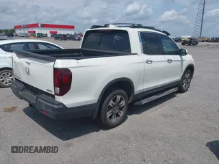 2019 Honda Ridgeline RTL-E with VIN 5FPYK3F77KB021667, listed as a IAAI auction lot 42115019 with 87,221 mi miles and . Bid and sale history available at DreamBid. Image 4.