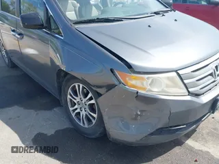 2011 Honda Odyssey EX-L with VIN 5FNRL5H69BB092752, listed as a IAAI auction lot 42245534 with 142,718 mi miles and . Bid and sale history available at DreamBid. Image 6.