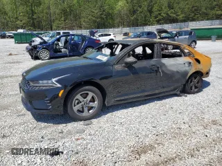 2023 Kia K5 LXS z VIN 5XXG14J28PG180646, wystawiony jako Copart lot #51508945 z przebiegiem Nie podano mil oraz Nie do naprawy • Non repairable. Historia ofert i sprzedaży dostępna na DreamBid. Obrazek 1.