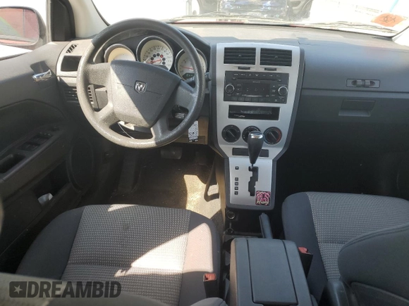 2009 Dodge Caliber SXT with VIN 1B3HB48A29D144304, listed as a Copart auction lot 53119375 with 173,778 mi miles and Salvage Title. Bid and sale history available at DreamBid. Image 8.