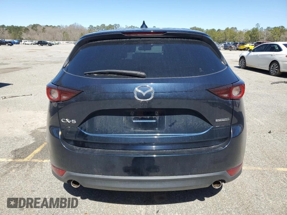 2021 Mazda CX-5 Touring with VIN JM3KFACM1M0442455, listed as a Copart auction lot 48187985 with 49,970 mi miles and Salvage Title. Bid and sale history available at carsss.com. Image 6.