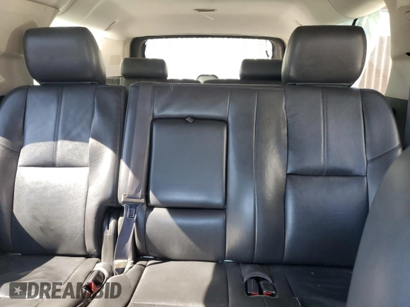 2014 Chevrolet Suburban LT with VIN 1GNSKJE71ER227075, listed as a Copart auction lot 76675654 with 214,113 mi miles and Salvage Title. Bid and sale history available at DreamBid. Image 10.