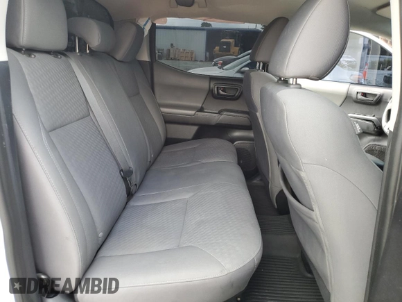 2021 Toyota Tacoma SR с VIN 3TMCZ5AN4MM386662, выставлен на аукционе Copart как лот 56954865 с пробегом 70 623 миль миль и Списание • Salvage title. История ставок и продаж доступна на DreamBid. Изображение 10.