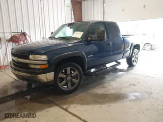1999 Chevrolet Silverado 1500 LS with VIN 2GCEC19W4X1234733, listed as a IAAI auction lot 41893288 with 158,825 mi miles. Bid and sale history available at carsss.com. Image 2.