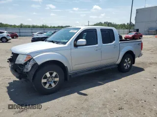 2010 Nissan Frontier Pro-4X with VIN 1N6AD0EV5AC435641, listed as a Copart auction lot 63388025 with 84,349 mi miles and Salvage title. Bid and sale history available at DreamBid. Image 1.