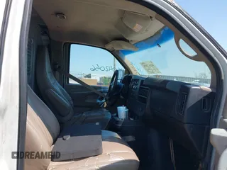 2012 Chevrolet Express Cargo Van with VIN 1GCWGFCA6C1147841, listed as a IAAI auction lot 42042056 with 248,374 mi miles. Bid and sale history available at carsss.com. Image 5.