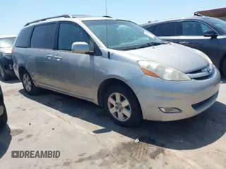 2010 Toyota Sienna XLE with VIN 5TDYK4CC9AS336044, listed as a IAAI auction lot 42013057 with 183,567 mi miles. Bid and sale history available at carsss.com. Image 1.