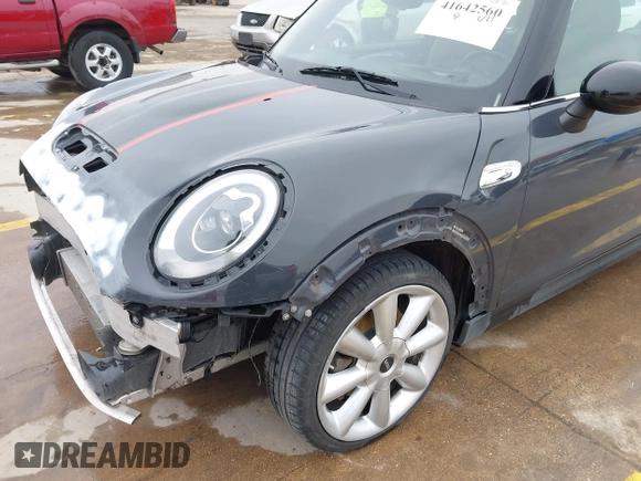 2014 MINI Hardtop S with VIN WMWXM7C56ET926604, listed as a IAAI auction lot 41642560 with 81,219 mi miles and . Bid and sale history available at DreamBid. Image 6.
