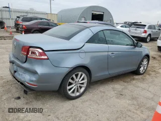 2013 Volkswagen Eos Komfort с VIN WVWBW8AH4DV001042, выставлен на аукционе Copart как лот 49492745 с пробегом 119 825 миль миль и Списание • Salvage title. История ставок и продаж доступна на DreamBid. Изображение 3.