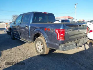 2015 Ford F-150 XLT with VIN 1FTEW1EP7FFD00589, listed as a IAAI auction lot 41677203 with 156,064 mi miles. Bid and sale history available at carsss.com. Image 3.