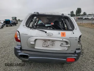 2003 Hyundai Santa Fe GLS with VIN KM8SC73D03U458797, listed as a Copart auction lot 69877294 with 0 mi miles and Salvage Title. Bid and sale history available at carsss.com. Image 6.