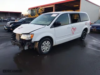 2017 Dodge Grand Caravan SE with VIN 2C4RDGBG1HR717961, listed as a IAAI auction lot 40874013 with 298,790 mi miles. Bid and sale history available at carsss.com. Image 2.
