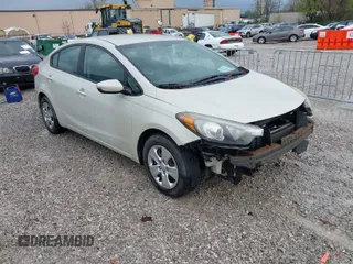 2015 Kia Forte LX with VIN KNAFK4A67F5404730, listed as a IAAI auction lot 41948690 with 201,563 mi miles. Bid and sale history available at carsss.com. Image 1.
