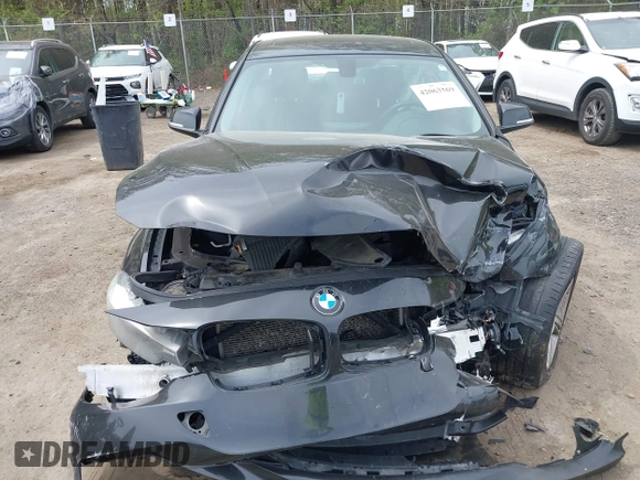 2014 BMW 3 Series 320i xDrive with VIN WBA3C3C59EF984070, listed as a IAAI auction lot 42063569 with 169,002 mi miles and . Bid and sale history available at DreamBid. Image 12.