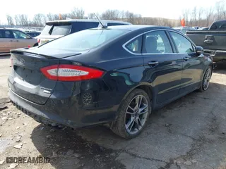 2015 Ford Fusion Titanium with VIN 3FA6P0D91FR277852, listed as a IAAI auction lot 41775806 with 82,684 mi miles. Bid and sale history available at carsss.com. Image 4.