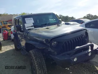 2019 Jeep Wrangler Unlimited Sport Altitude with VIN 1C4HJXDG3KW639148, listed as a IAAI auction lot 41933844 with 57,184 mi miles and . Bid and sale history available at DreamBid. Image 13.