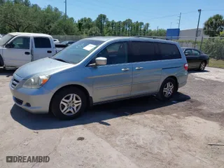 2006 Honda Odyssey EX-L with VIN 5FNRL38776B098021, listed as a IAAI auction lot 42036487 with 176,043 mi miles. Bid and sale history available at carsss.com. Image 2.