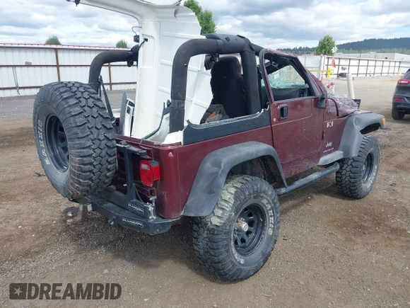 2003 Jeep Wrangler X z VIN 1J4FA39S73P349014, wystawiony jako IAAI lot #42582747 z przebiegiem 50 525 mil mil oraz . Historia ofert i sprzedaży dostępna na DreamBid. Obrazek 4.